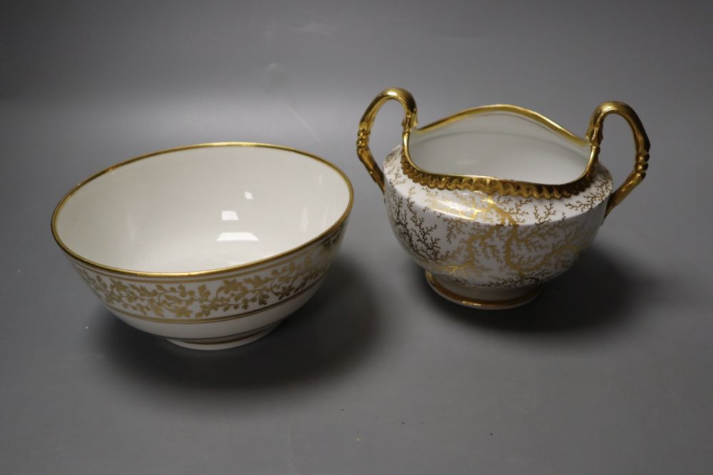 A Flight Barr and Barr seaweed gilt two handled sucrier and a Flight Barr Worcester bowl gilt with leaves and flowers and the initials